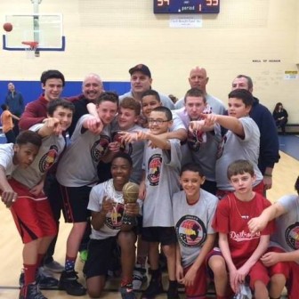 Dunellen's 7th grade travel basketball team and coaches celebrate first JBA championship. March 2016