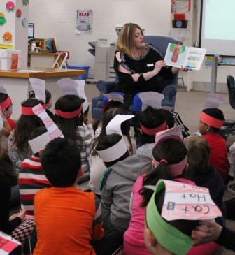 Jamie M. Miller reads to Faber school children. March 2016