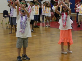 Dunellen kindergarten children perform and sign to “Under The Sun” at 2016 Proud Day.