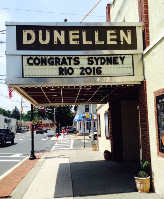 Dunellen Theater commemorated McLaughlin's feat with a special marquee message while local residents hung American flags and patriotic buntings in honor of their favorite Olympian.