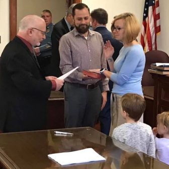 Stacey Narvesen was sworn in as Dunellen councilperson by Dunellen Borough Clerk William Robins, witnessed by her family.