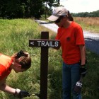 Middlesex County Conserfvation Corps works on trail sign for county's Open Space program.